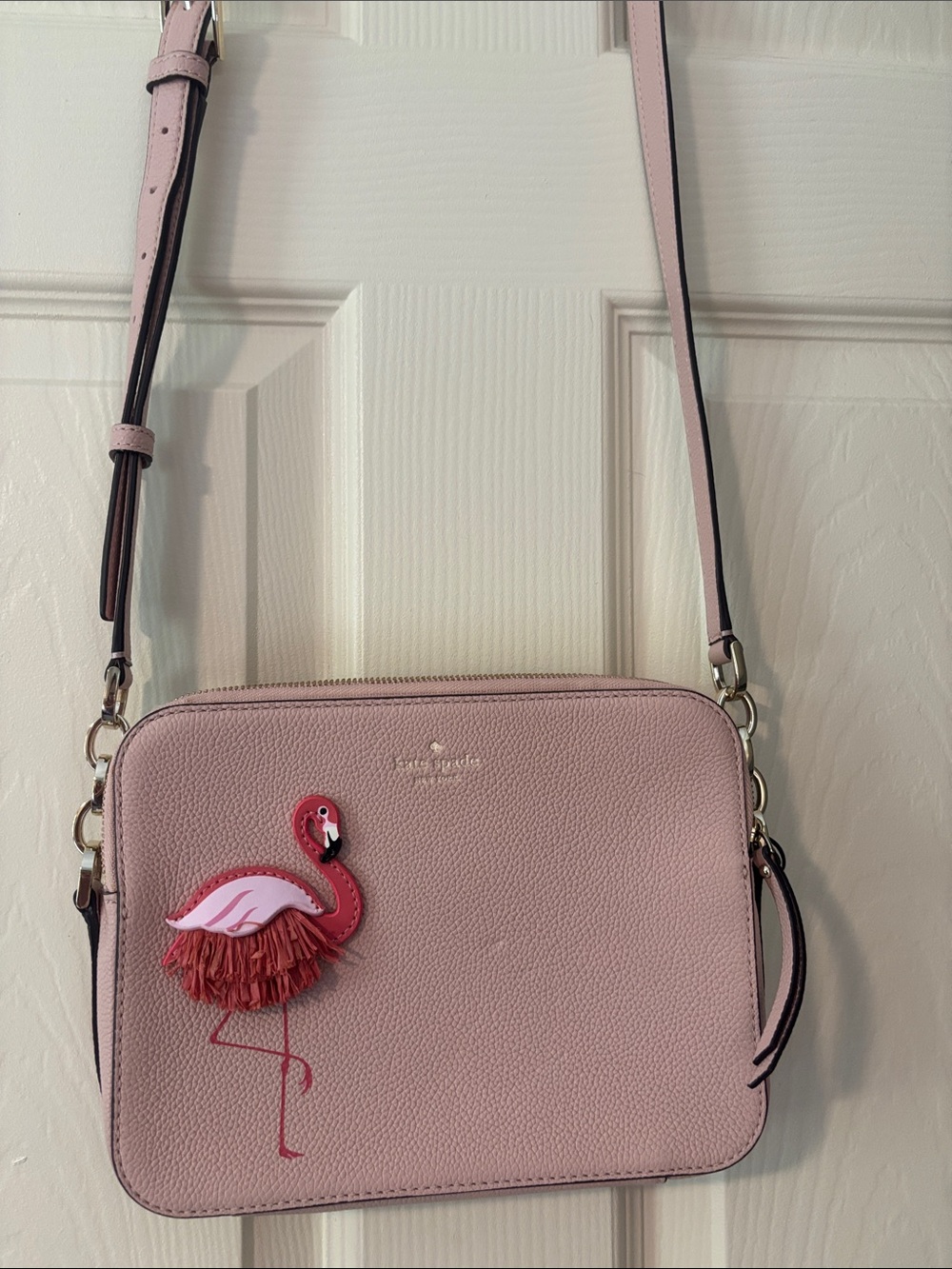 Pretty in Pink Flamingo cross body camera bag by Kate Spade.